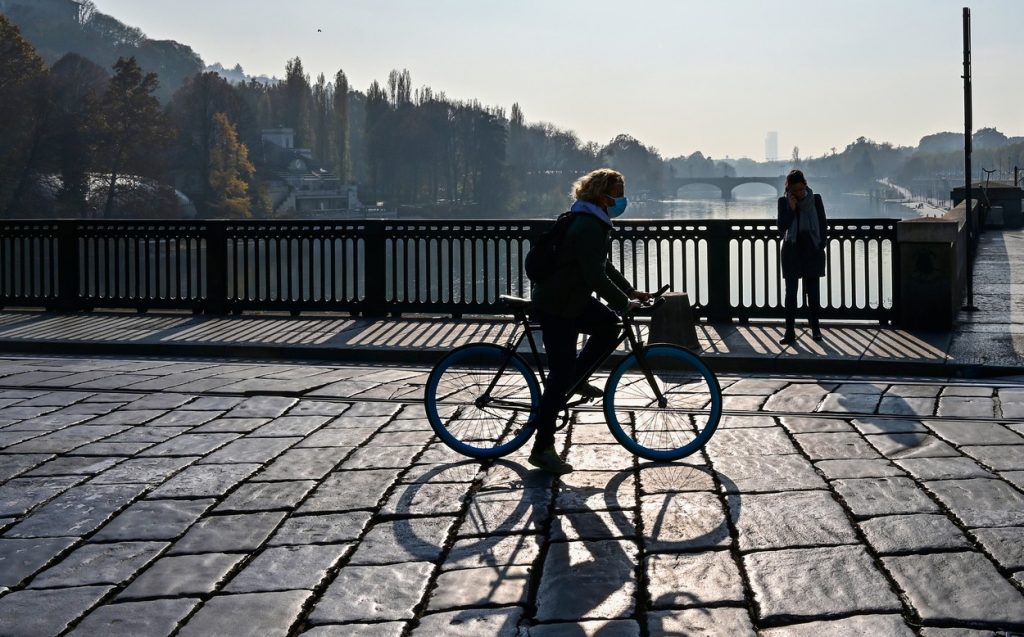 Woman cycling in a city