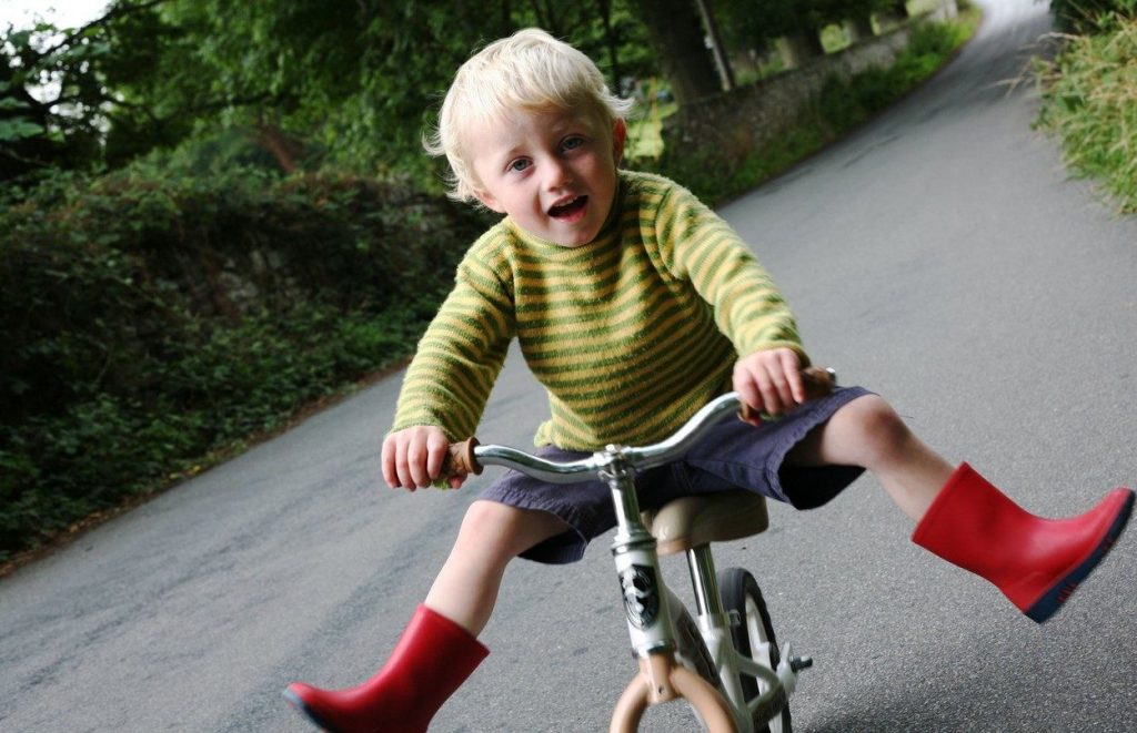 Child on a balance bike
